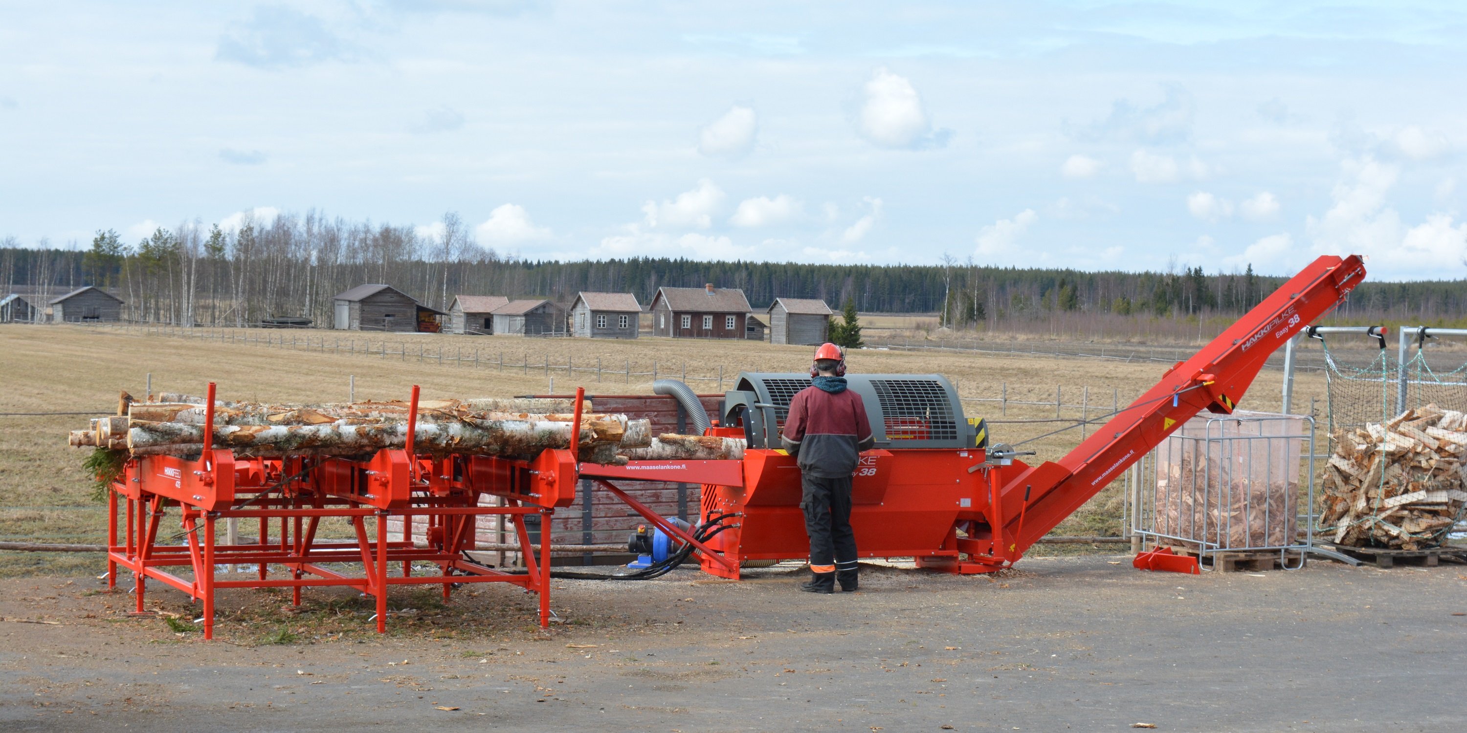 A sawdust blower in use with Hakki Pilke firewood processor.